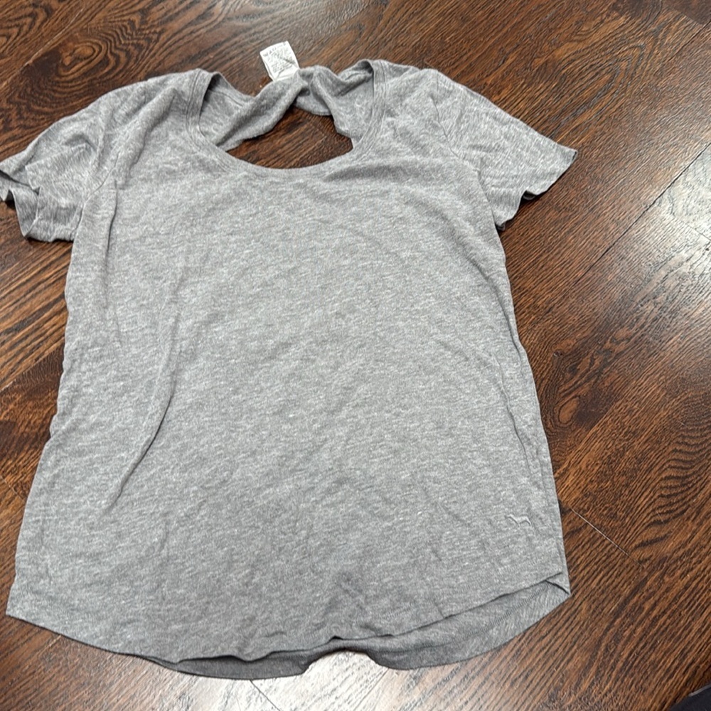 Victoria’s Secret pink short sleeve open back T-shirt, size medium